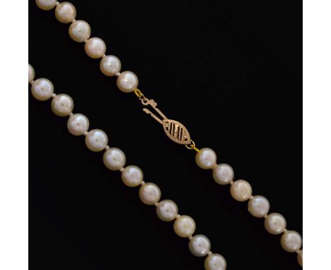 Cultured pearl necklace, '10K' gold clasp, length 16-inch approx, the sixty uniform pearls each measure 6.5mm diameter approx