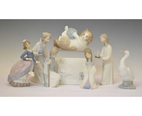 Lladro - Six porcelain figures to include; 'Girl with Parasol', 'Girl with candle', children's nativity - 'Virgin Mary', 'She