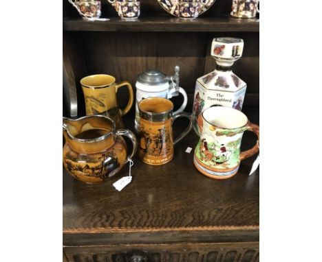 COLLECTION OF RIDGWAYS AND OTHER JUGS AND TANKARDS comprising Winter Days Amusement jug, Palissey fishing scene mug, Davenpor