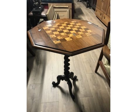 VICTORIAN TURNOVER TOP OCTAGONAL CHESS TABLE raised on barley twist support and tripod base, width 53cms