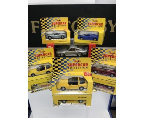 NINE MAESTO SUPERCAR COLLECTORS DIECAST VEHICLES including Bugatti EB110; two Aston Martin DB7; Jaguar XJ220; MGB; Corvette e