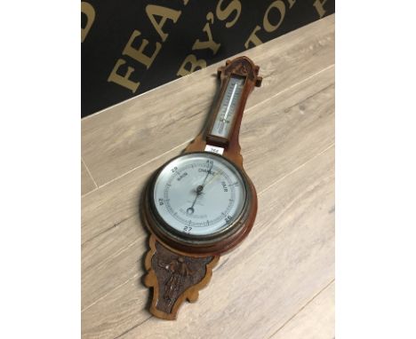 EARLY 1900s MERCURY BAROMETER by Clark of Newcastle, the silvered dial with weather change indicators below the Fahrenheit/Ce