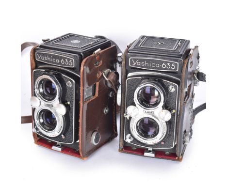 Two Yashica-635 Copal-MXV medium format TLR film cameras, circa 1970s, serial nos. ST 4041084 & SX 0031728, each with twin Ya