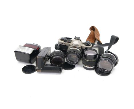 Olympus OM-4 T camera body serial no. 1126911, with two Olympus OM-System Zuiko MC Auto-S lenses, one 1:1.54 f=50mm, the othe