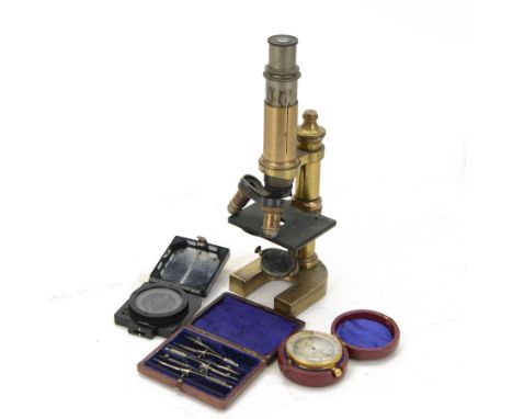 Early 20th century Austrian brass monocular microscope by C Reichert, together with a brass cased pocket barometer by Griffin