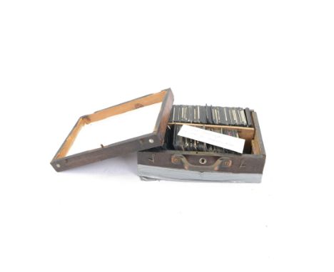 Collection of magic lantern slides, including examples by Graystone Bird of Bath and scenes of Old Scarborough, in wooden box