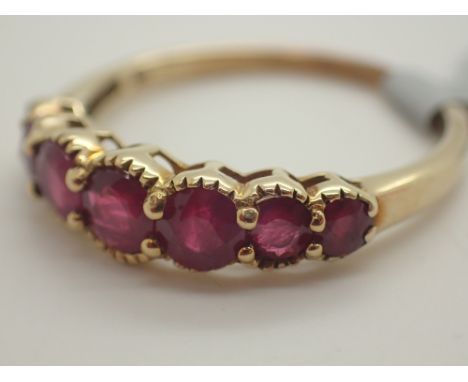 Pre owned unused 9ct gold seven stone set Burmese ruby half eternity ring size O 1.9g