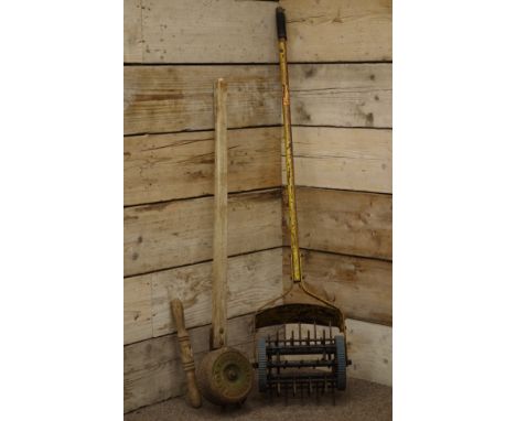 'T. Green & Sons Ld, Leeds & London' vintage lawn edge trimmer and a vintage lawn aerator   Condition Report   Click here for