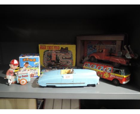 A selection of vintage tin plate toys games and cars including Favorit Car 