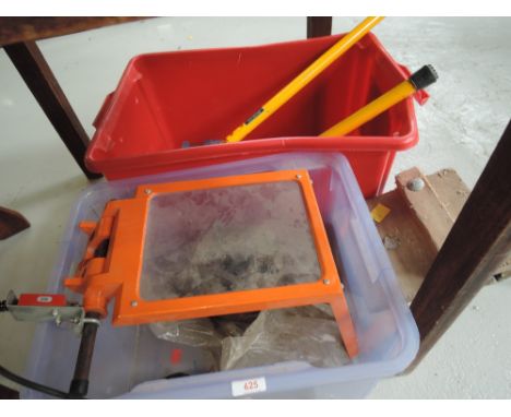 A selection of tools, bench vice etc