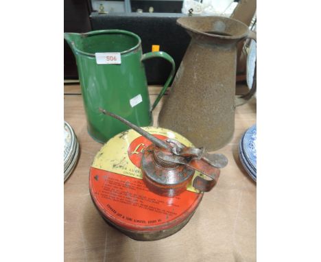 A selection of vintage motor oil and engine related tins