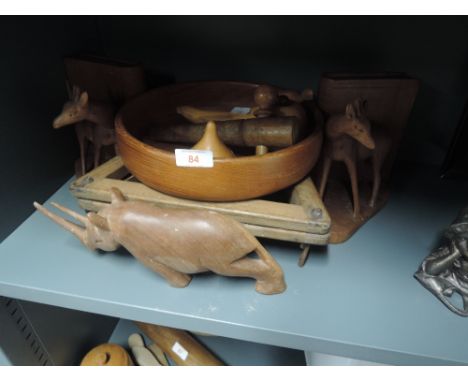 A selection of vintage treen and wood carved decorations including deer bookends