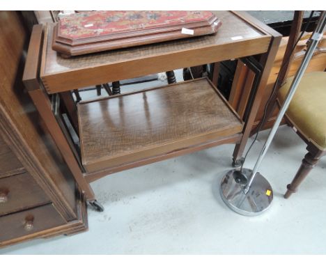 A vintage fold out tea trolley