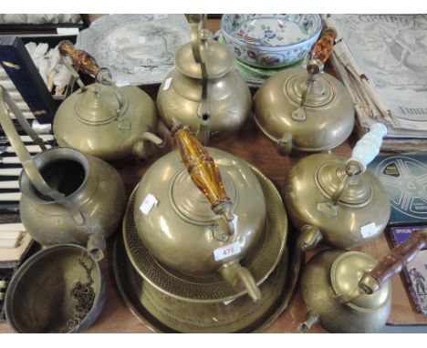 A selection of vintage brass indian style kettles etc