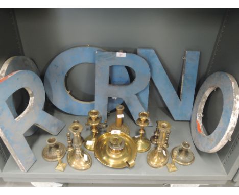 A selection of vintage large advertising sign letters cut from wood