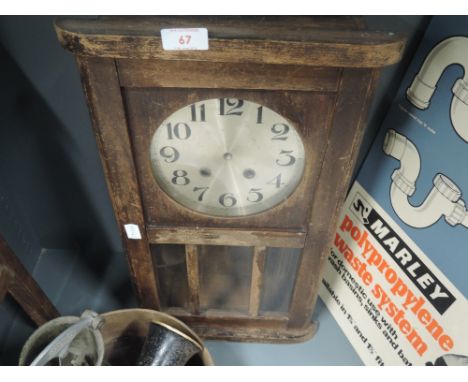 A vintage wall mounted clock AF