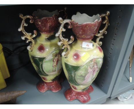 A pair of vintage mantle vases with transfer print