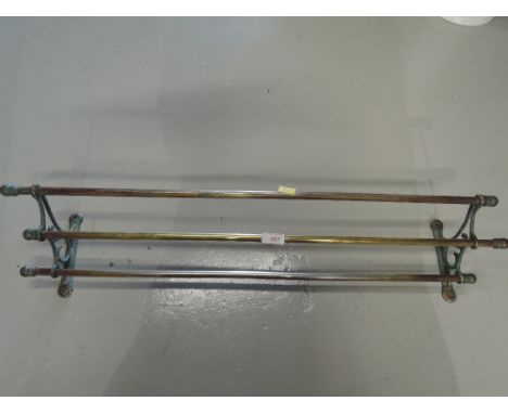 A vintage brass rack