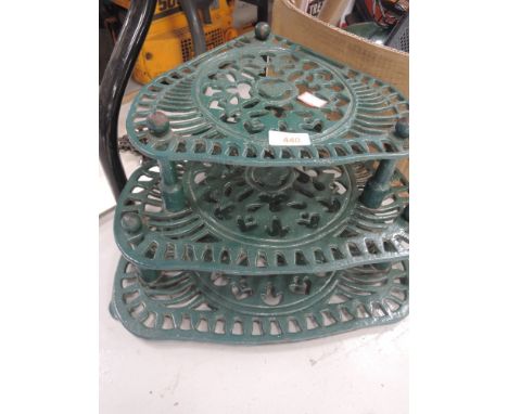 A vintage cast iron kitchen or other corner stand