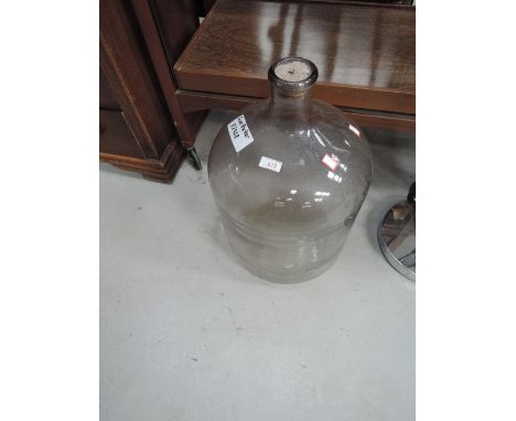 A vintage glass demijohn/carboy