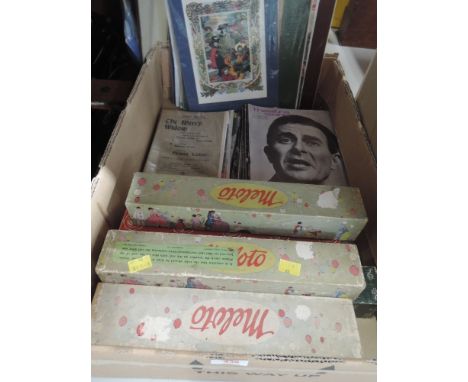 A selection of vintage theatrical and musical items including pianola rolls