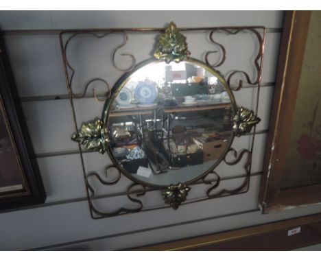 A vintage Kitsch mirror with metal frame work