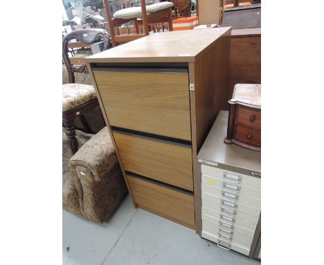 A vintage style three drawer filing cabinet