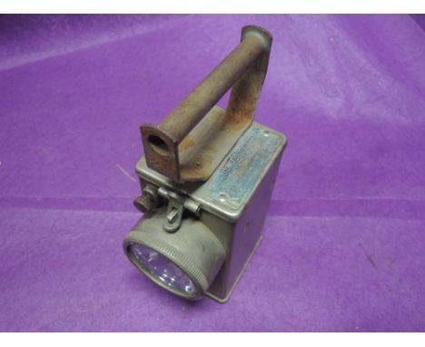A vintage miners style lamp torch 