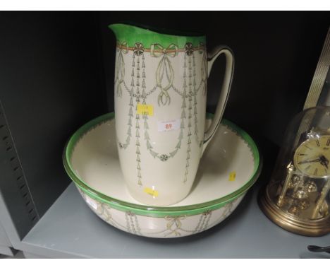 A vintage wash jug and bowl set by Royal doulton