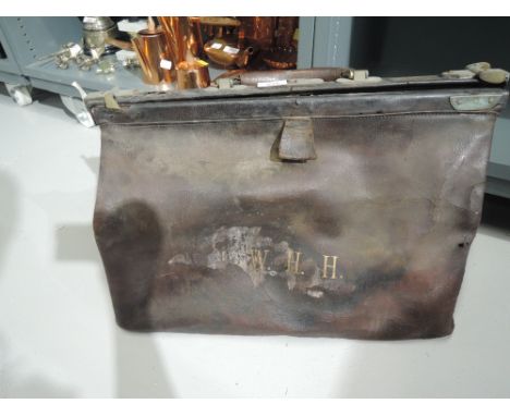 A vintage leather carry case doctors bag style initials WHH