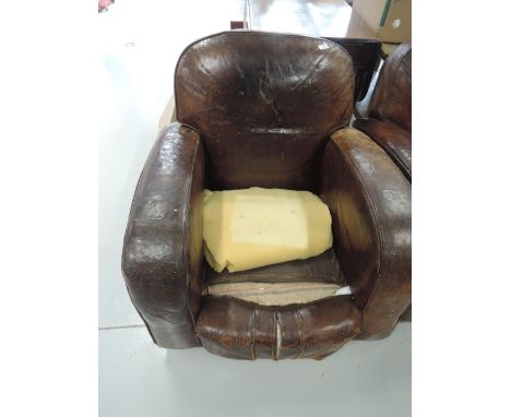 A vintage art deco leather club style armchair 