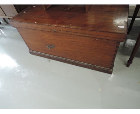 A traditional hardwood bedding or tool chest
