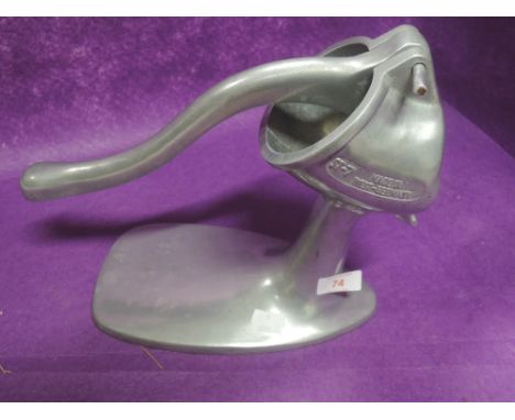 A vintage atomic style kitchen fruit press in cast aluminium made in W Germany ST-7 by Standard 