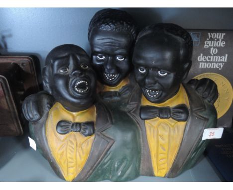 A vintage ceramic figure bust of three American jazz or blues singers 1930's style