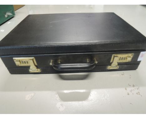 A vintage leather bound suitcase