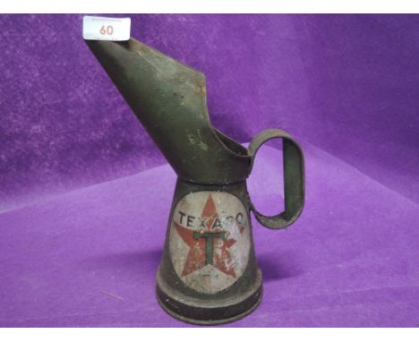 A vintage motor oil advertising jug decanter for Texaco 