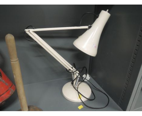 A genuine angle poise lamp in cream