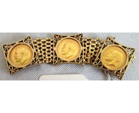 A 9ct gate link bracelet set with three gold sovereigns. Condition Report: 46 grams.