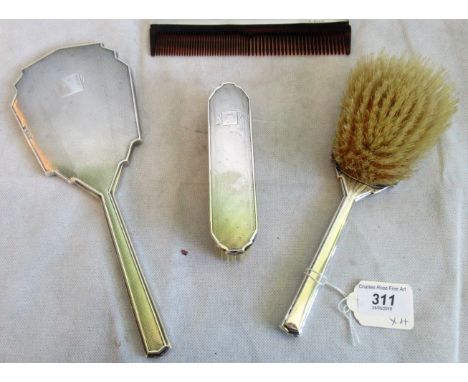 A silver four piece dressing table set, comprising: two brushes, hand mirror and comb, each with engine turned decoration and