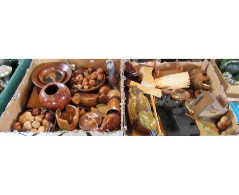Two boxes containing a good many craftsmen made wooden artifacts, to include: carved wooden duck decoys, puzzle boxes, carved