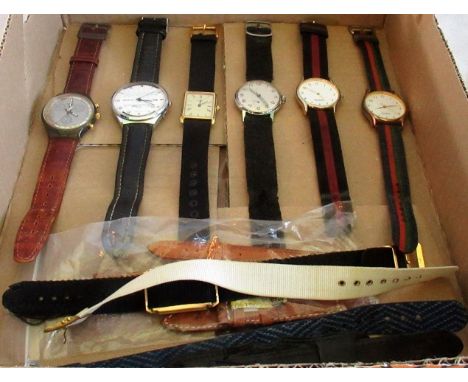 A collection of gentleman's quartz and other wristwatches, including: Swatch, Rotary etc and various watch bracelets.