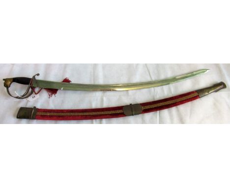 A early 20th century decorative Indian saber, mock watered blade, velvet coloured scabbard and animal pommel.