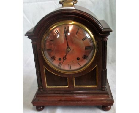 A George III design mahogany cased eight day mantle clock, chiming on a series of coiled gongs, with convex dial marked out i