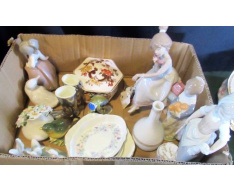 A collection of decorative porcelain, to include: Lladro and Nao porcelain figures, lidded box, boot measures, garden birds a