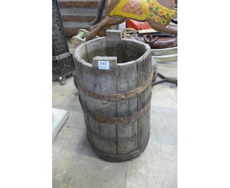An oak barrel planter