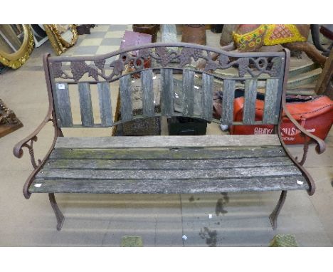 A cast iron ended garden bench