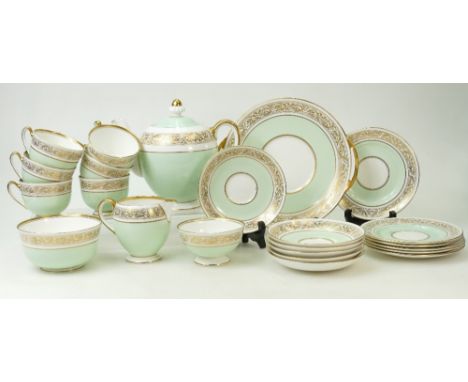 Royal Doulton gilded teaset: Royal Doulton tea set - light green ground with gilded borders. (23)