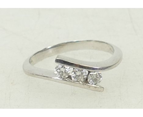 18ct white gold Diamond ring: Ring set with 3 stones, approx .10ct each stone, size L, 3.2grams.