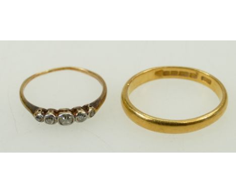 22ct gold wedding ring &amp; diamond ring:  22ct 4.4g - misshapen and a yellow coloured set diamond ring 1.3g (a/f). (2)