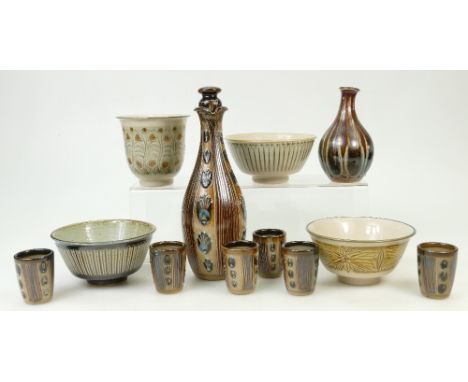 A collection of Doulton Lambeth studio stoneware: Doulton Lambeth Stoneware by Agnete Hoy, comprising sake bottle with cups, 